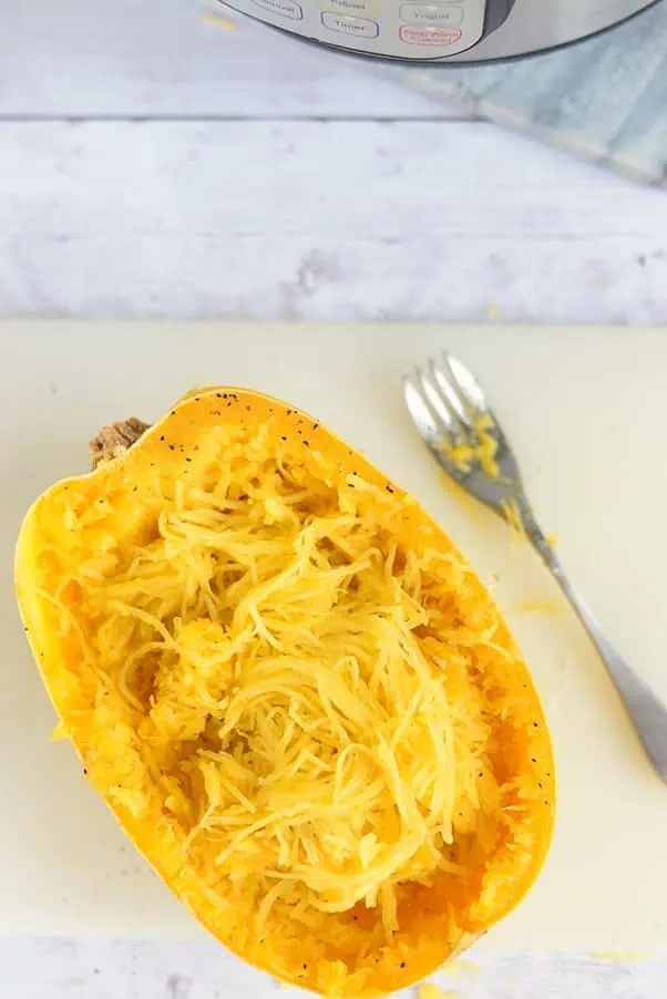 instant pot spaghetti squash on white plate with fork