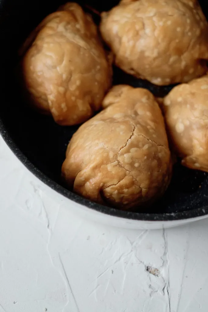 pear tarts faced down showing browned pie shell from being in the air fryer