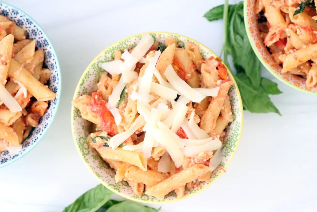 instant pot feta pasta viral tiktok in bowls with shaved parmesan cheese