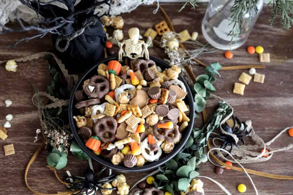 easy autumn trail mix with chex mix, chocolate, preztels, and more.