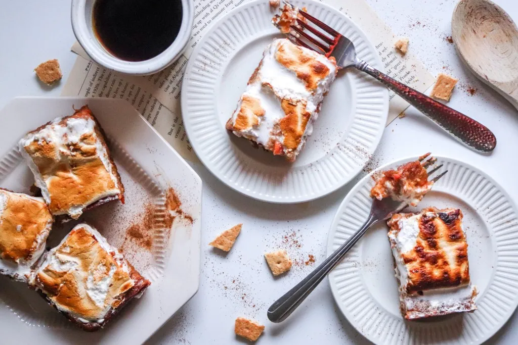 sweet potato pie bars on white plates with coffee