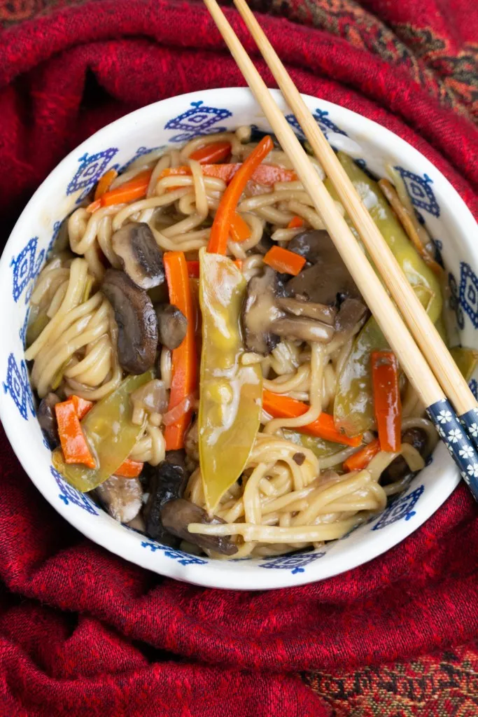 instant pot lo mein in a bowl with chopsticks
