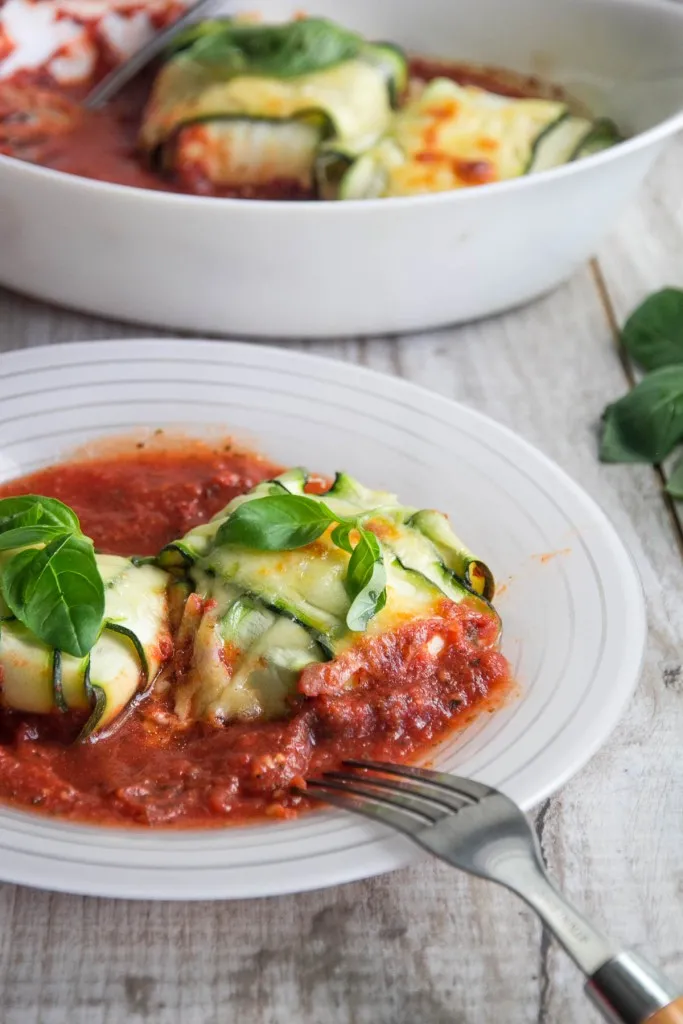 fresh baked zucchini ravioli recipe in a white plate