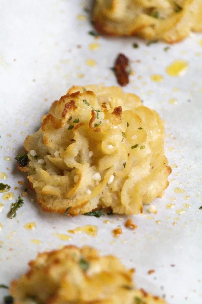 duchess potatoes sprinkled with fresh herbs