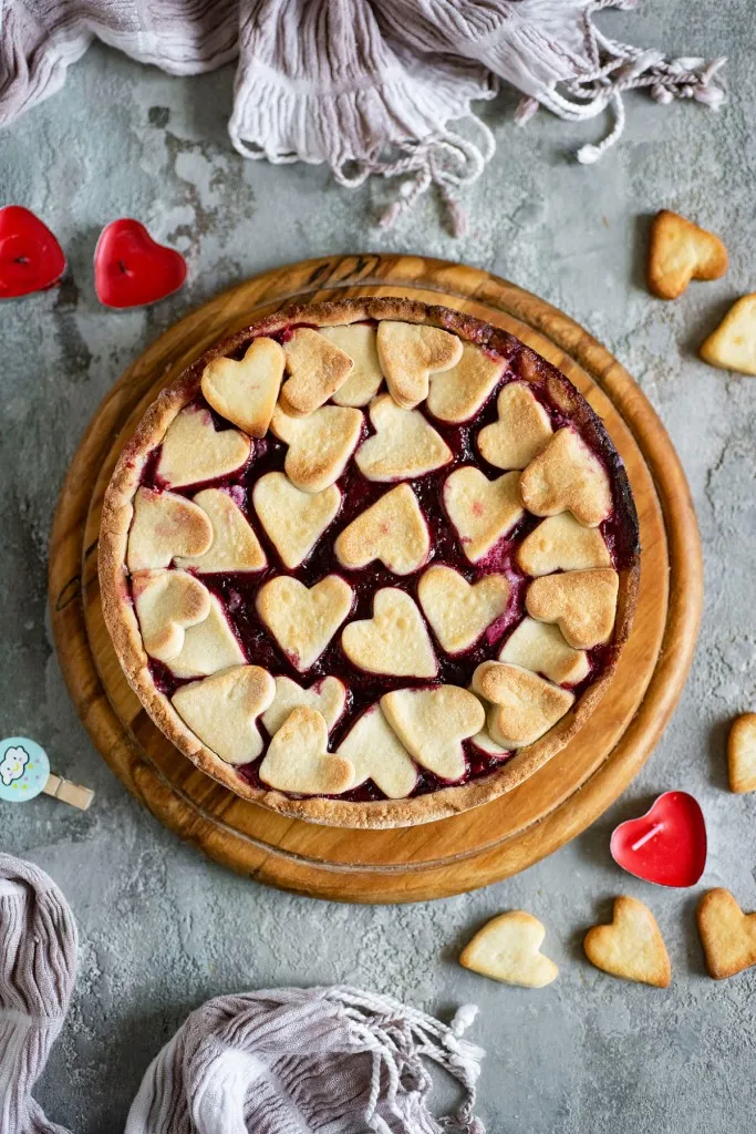 valentines day cherry tart on a grey background