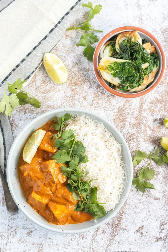 fresh cilantro over tofu curry with vermicelli