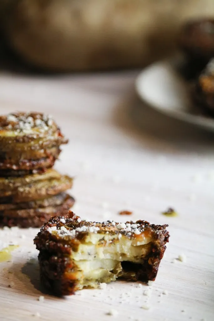 stacked potatoes with a bite