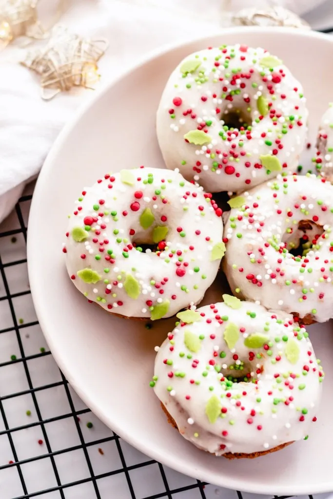 christmas doughnuts on a white plate