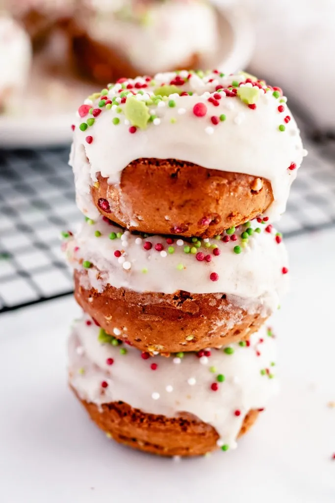 doughnuts stacked on each other with christmas sprinkles