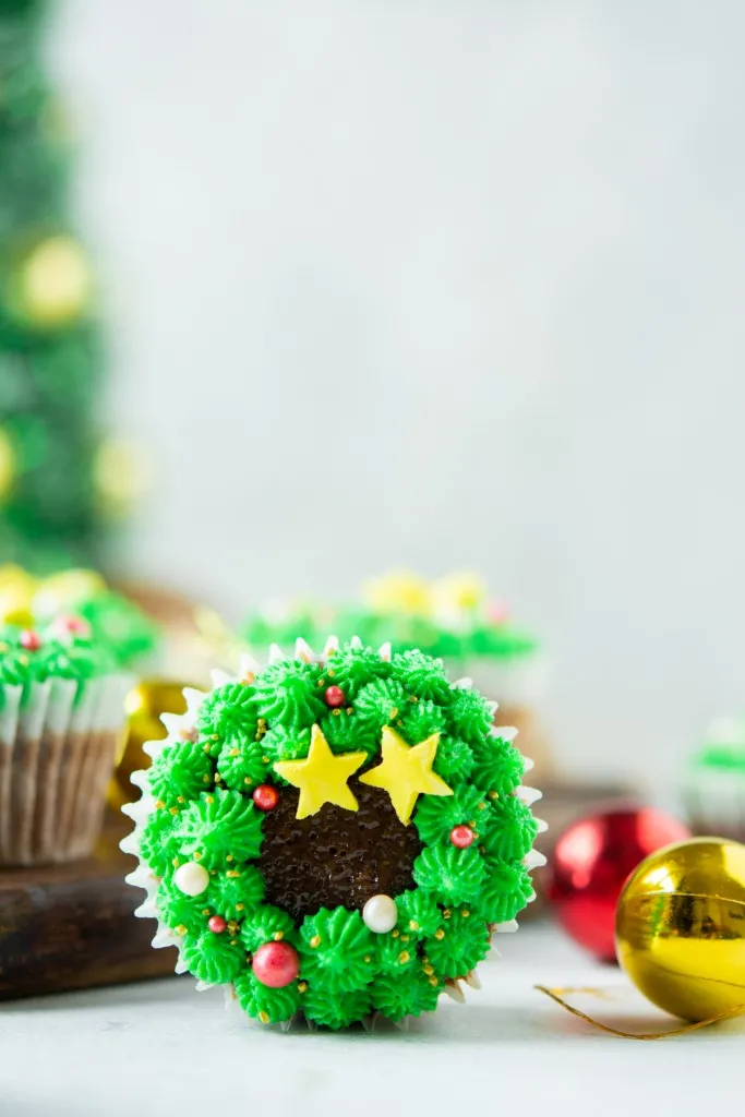 a sideview of christmas cakes with red and yellow ornaments