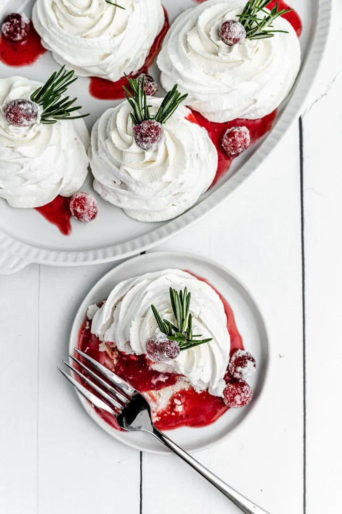 Christmas pavlova filled with cranberry curd infused with rosemary