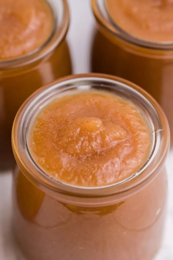 overhead shot of instant pot apple butter in a jar