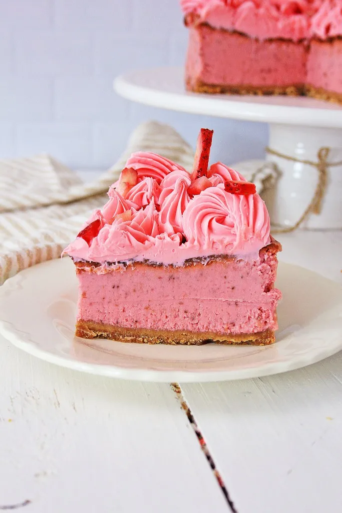 side view of a slice of strawberry cheesecake made in the air fryer