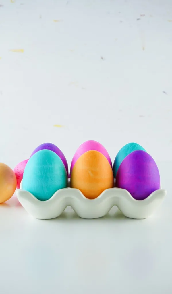side shot of food colored easter eggs