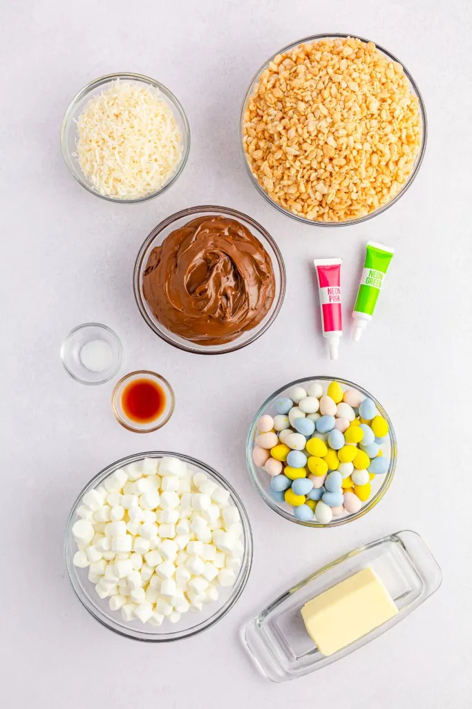 Ingredients for rice Krispies Easter nests on a white countertop.