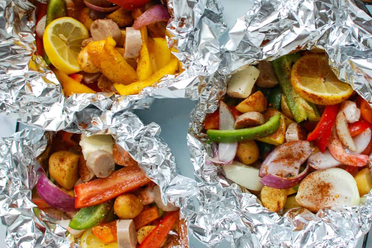 Sausage and shrimp foil packet dinners.