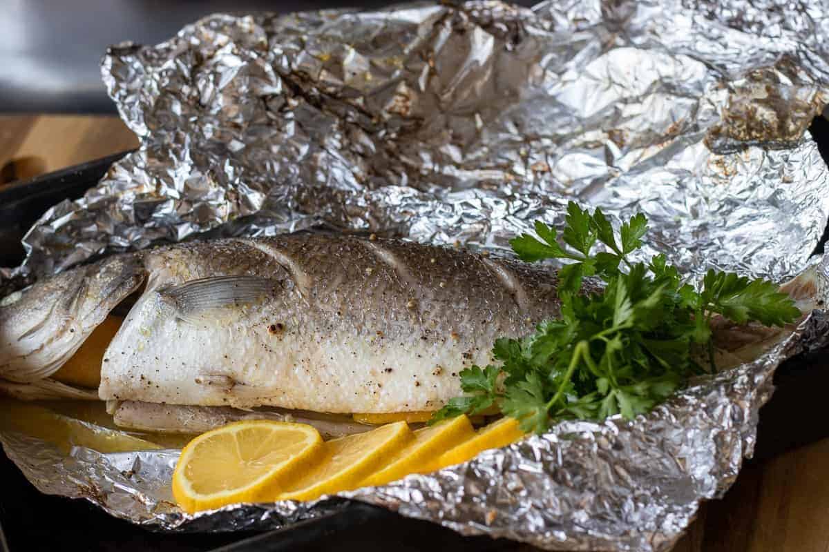 Baked sea bass in foil.
