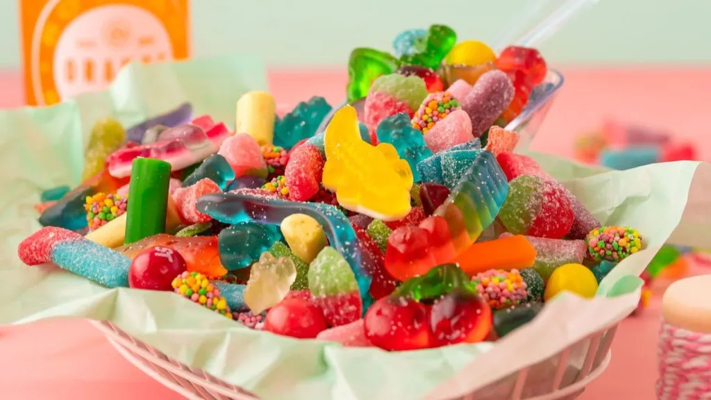 A bowl of assorted candies, salad style.
