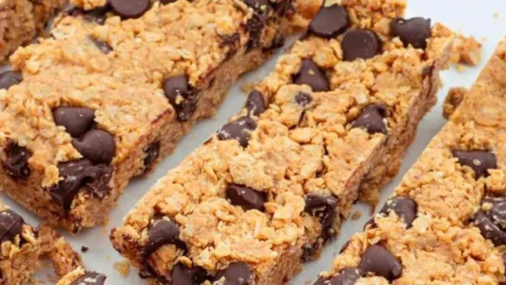 A batch of homemade granola cut into bars.