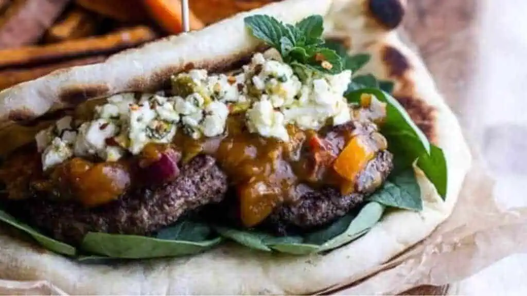 Moroccan Spiced Lamb Burgers with Apricot Chutney and Pistachio Feta Pesto