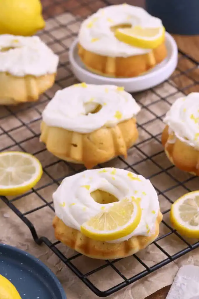 Mini Lemon Bundt Cakes on a wire cooling rack.