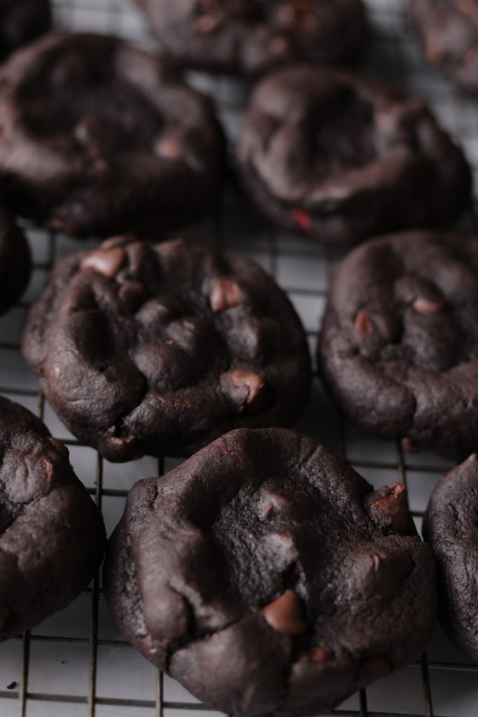Cookie tray of double-chocolate cookies with strawberry cream cores