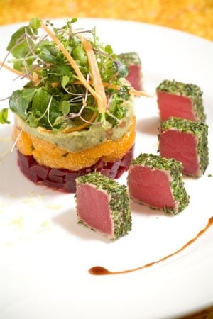 Chilled Herb Crusted Tuna over a red beet, mandarin orang and Avocado chilled salad