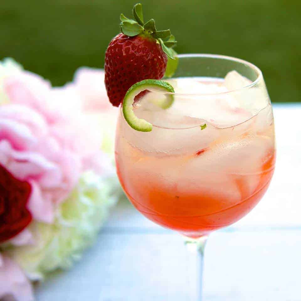 Strawberry Confusa Cocktail recipe made with Pura Vida Tequila. It's a super yummy and delicious cocktail for sure!