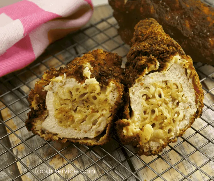 Macaroni and Cheese stuffed fried chicken is sure to be a hit everyone!