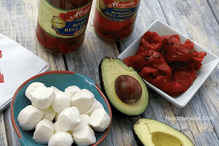 If you're looking for a delicious, healthy, and clean eating recipe, then try these amazing Roasted red pepper, avocado, and mozzarella bites! #bringtheheat #mezzetta #sp