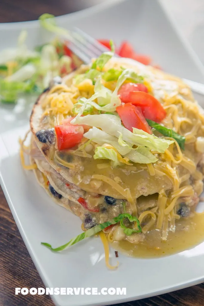 Everyone is going to love my skinny Instant Pot Chicken Enchiladas recipe! It's easy to make and super delicious, plus it's lower in fat!