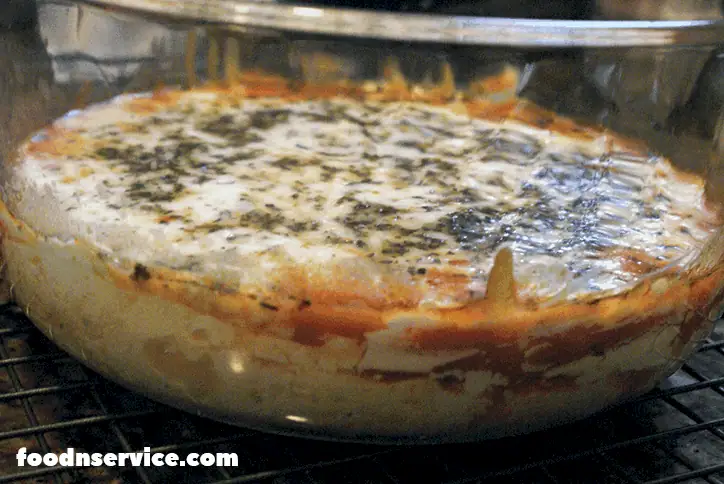 This instant Pot Pizza Dip is the best thing that could ever happen to your favorite party dip! It's perfect for any party or big game gathering that you have planned! #football #instantpot #pizzadip #recipes #instantpotrecipes #instantpotappetizers #appetizers