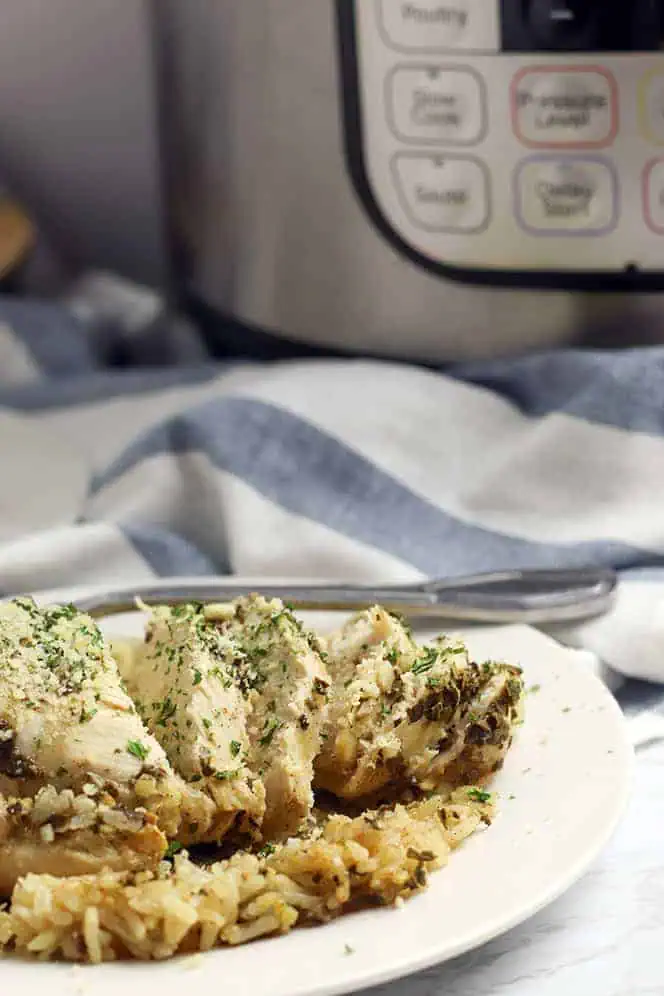 instant pot chicken and rice meal made in 30 minutes with fresh herbs