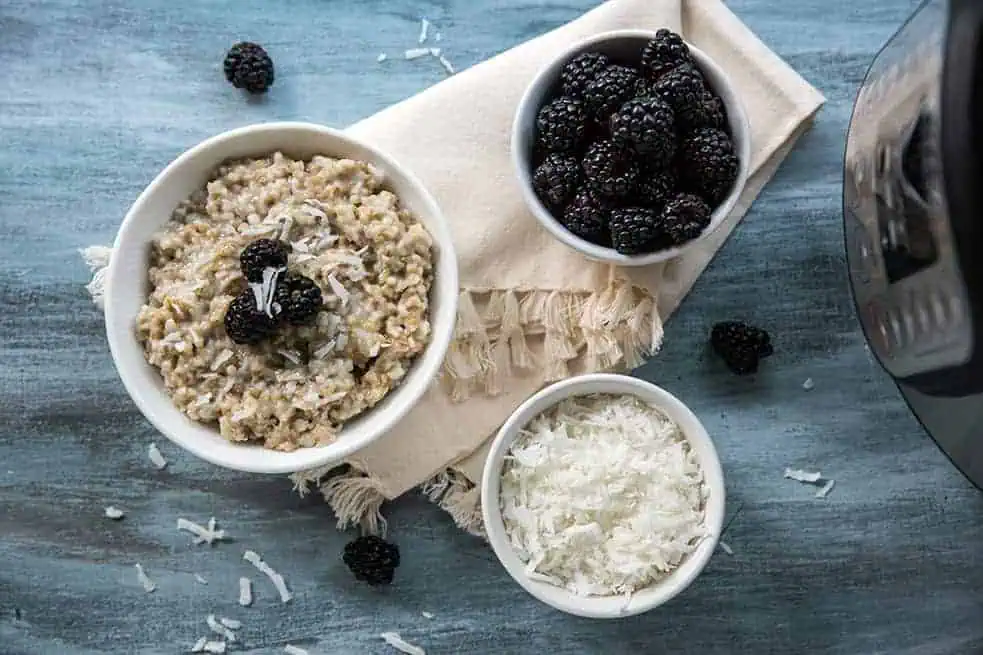 steel cut oats with blackberries and shredded coconut