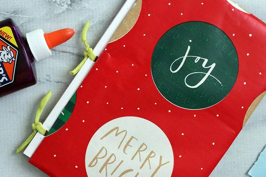 glue backing and cover of christmas junk journal
