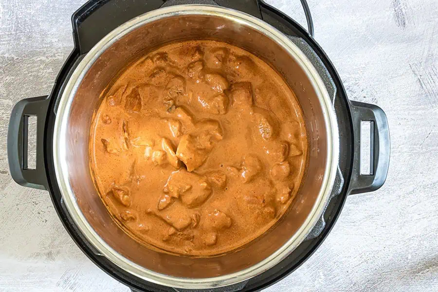 instant pot butter chicken final photo in the instant pot pressure cooker overhead shot