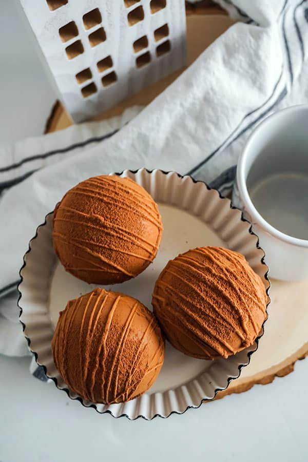 instant pot hot cocoa bombs on a white plate