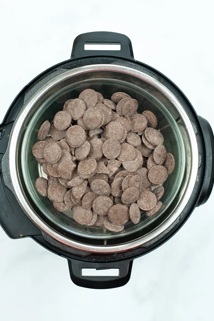 double boiler method for melting chocolate for the peanut butter eggs using an instant pot