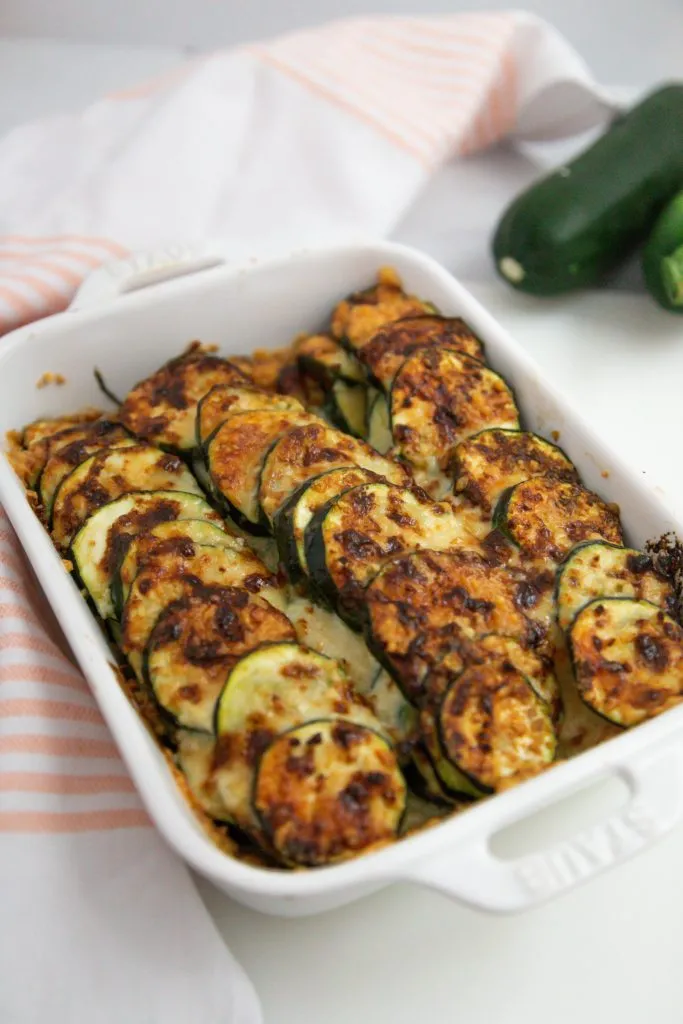 air fryer zucchini casserole au gratin in a white dish 