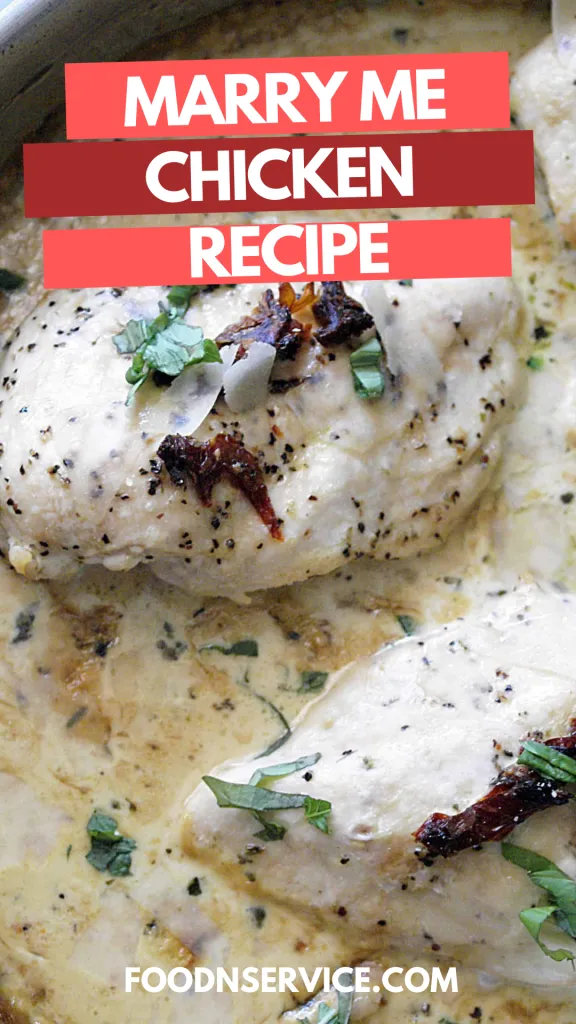 Skillet of creamy marry me chicken topped with fresh basil and parmesan.