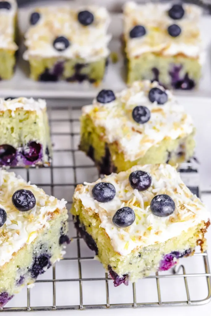 blueberry lemon cake on a cooling rack