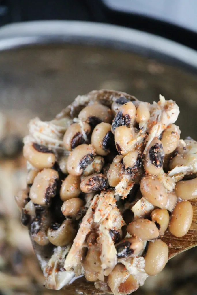 wooden spoon of black eyed peas