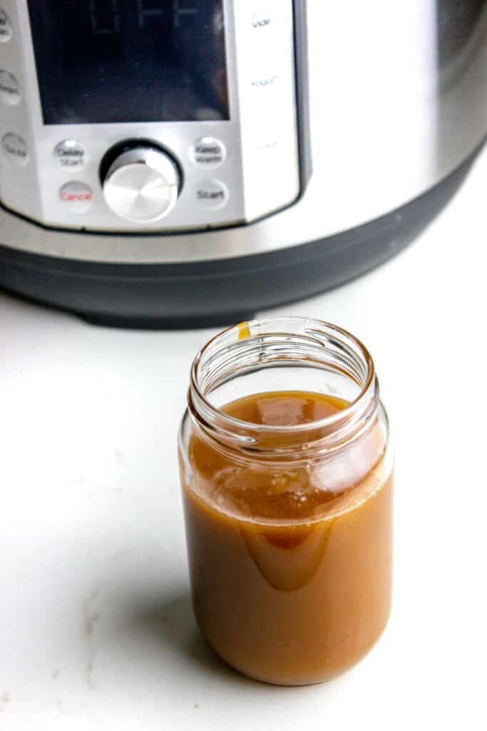 fresh made salted caramel sauce with instant pot in view
