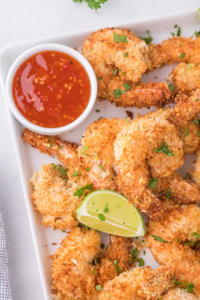 overhead shot of coconut shrimp with sweet chili sauce