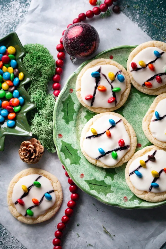 christmas lights cookies on a green plate