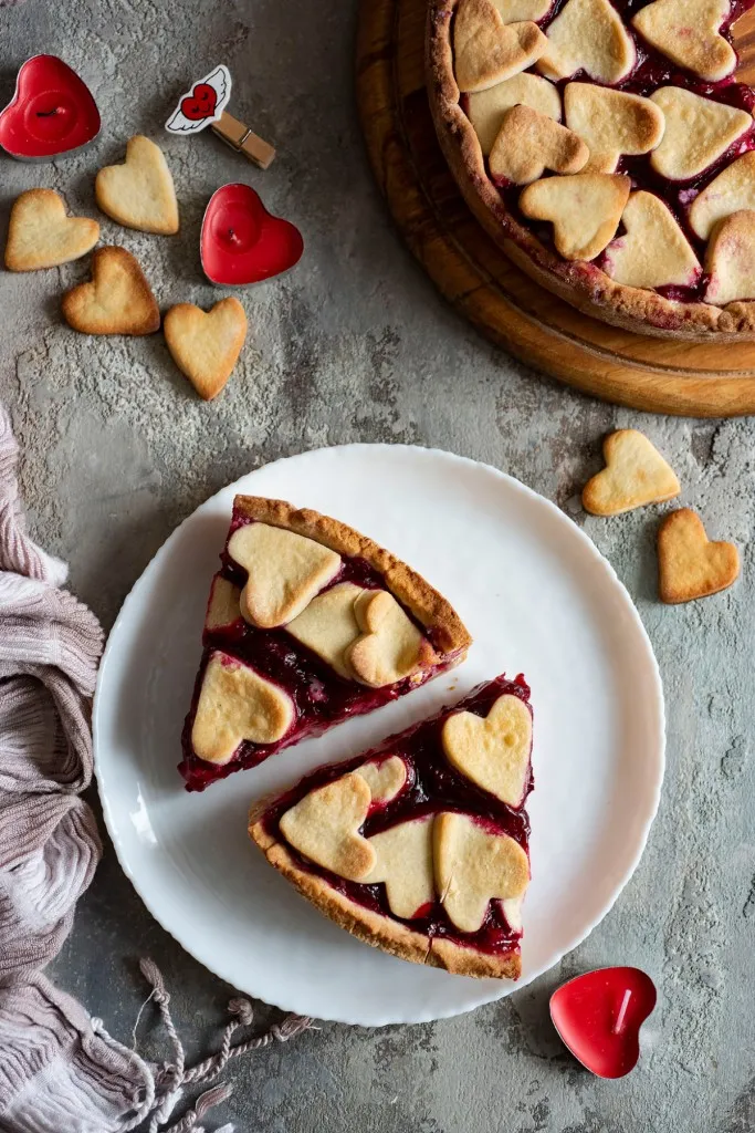 slices of cherry tart on a white plate