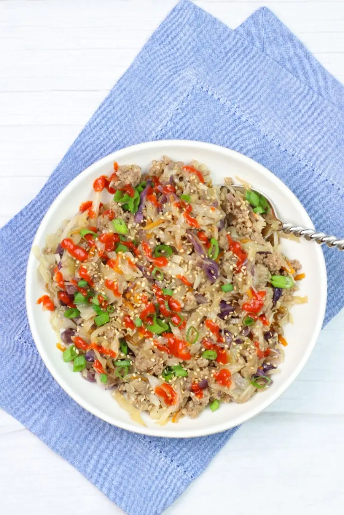 Low carb instant pot egg roll in a bowl on a white plate