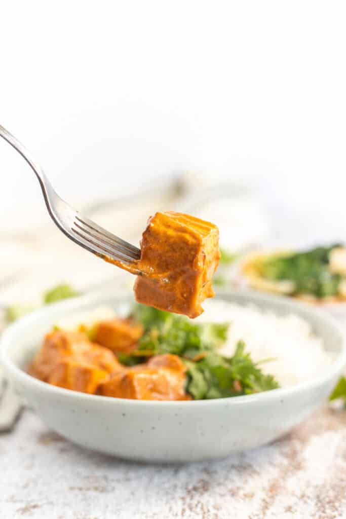 curry tofu on a fork made in the instant pot