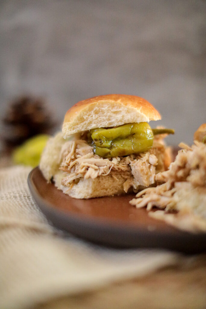 mississippi chicken sliders on a wooden board