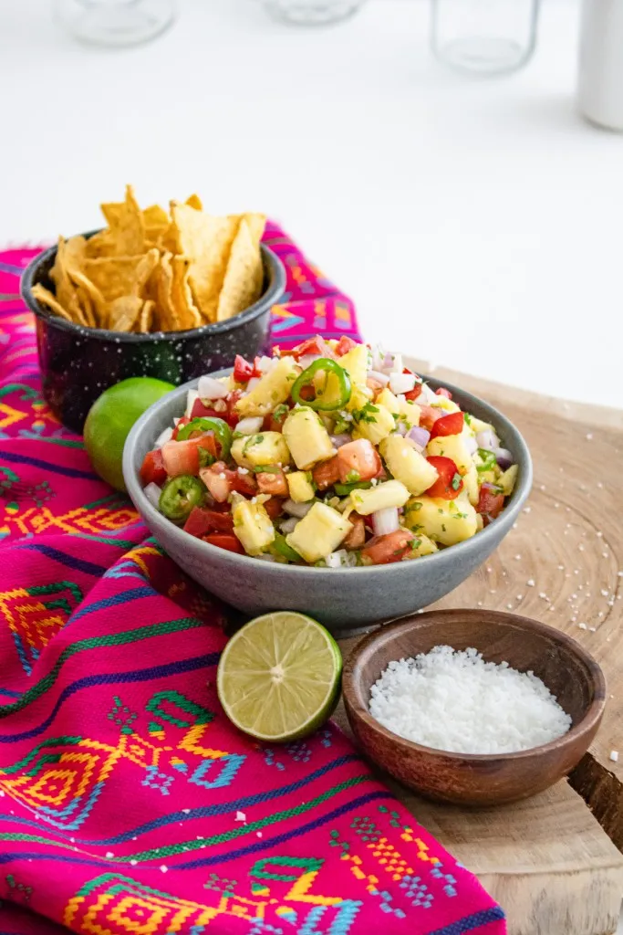 main hero image of pineapple salss with a side of tortilla chips